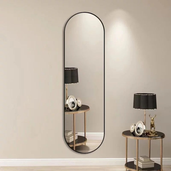 مرآة حائط بيضاوية بإطار أسود مقاس 150 × 50 سم